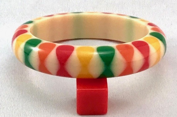 Evans10 Judith Evans cream resin bangle with 4 color bowties